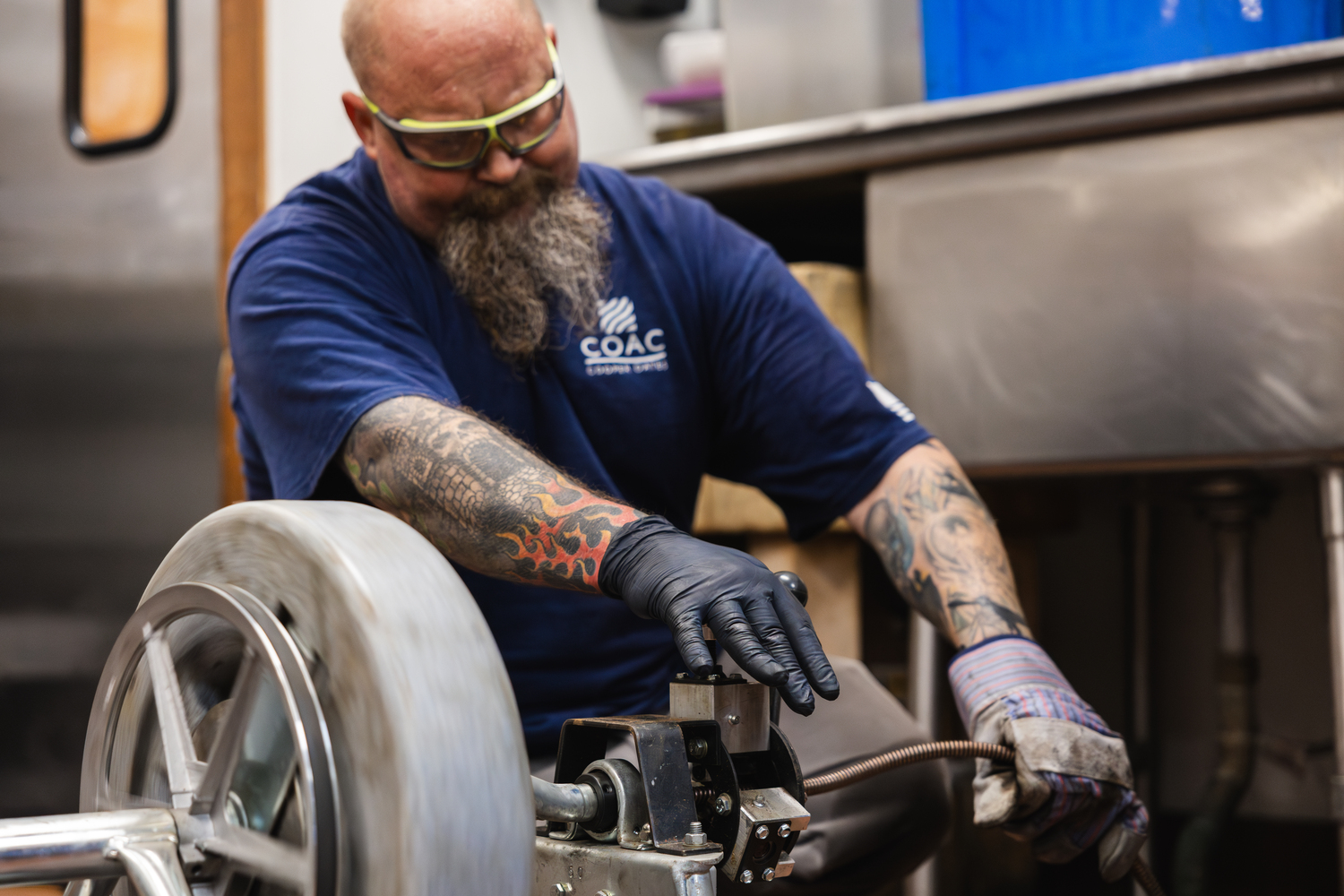 plumber-in-kitchen-at-work