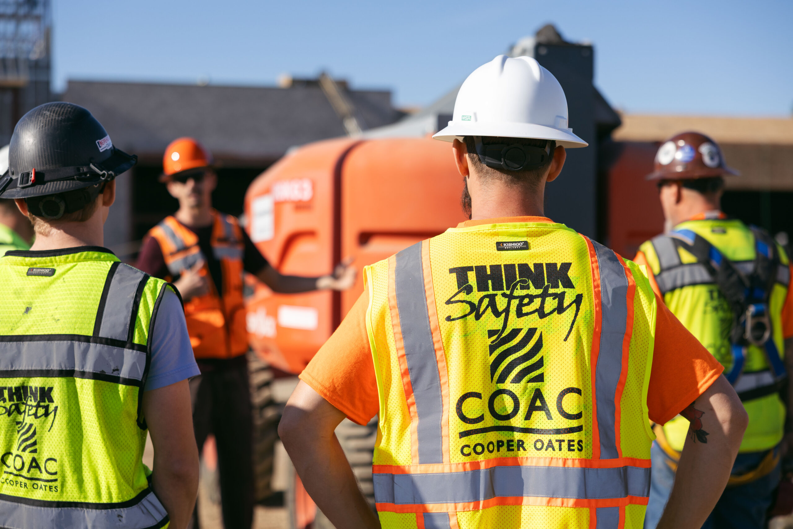 plumbing-construction-safety-training Safety meeting at construction job site